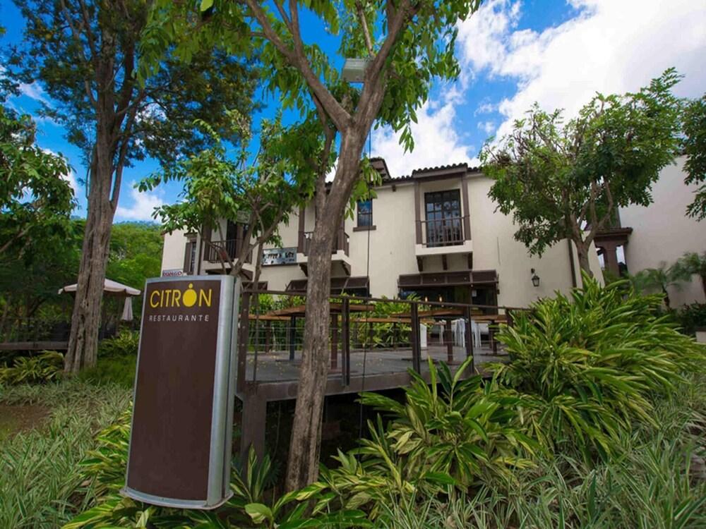 Elegant 2-BD Condo with Pool Exterior