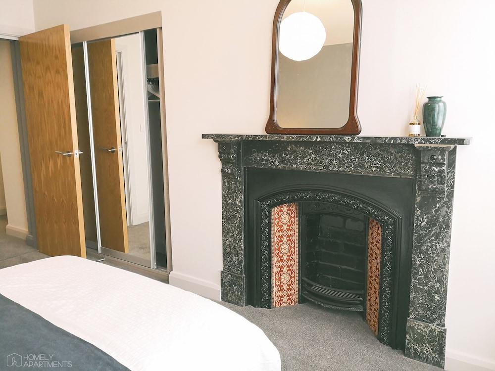 Homely Serviced Apartments - Figtree Room