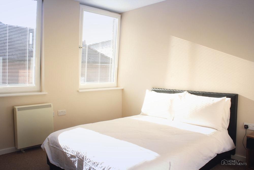 Homely Serviced Apartments - Figtree Room