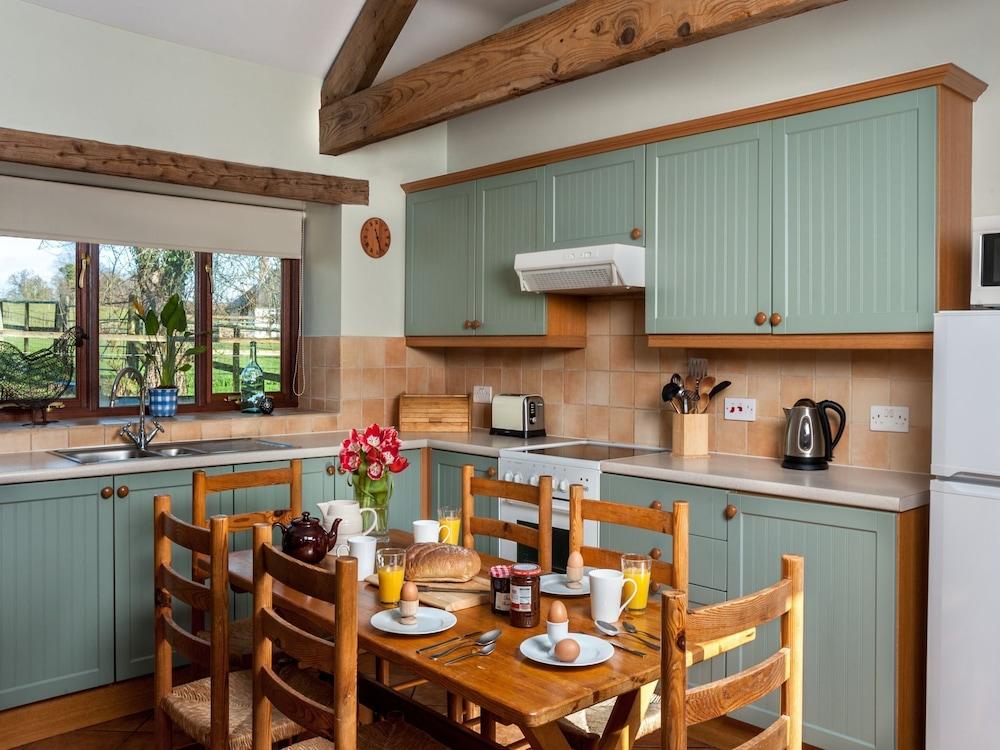 Cottage With Folding-doors in a Calm Environment Surrounded by Farming Fields