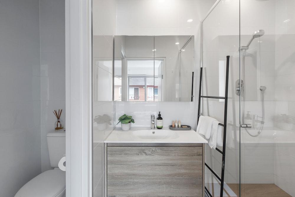 Heart of Ormond Apartment  by Ready Set Host Bathroom