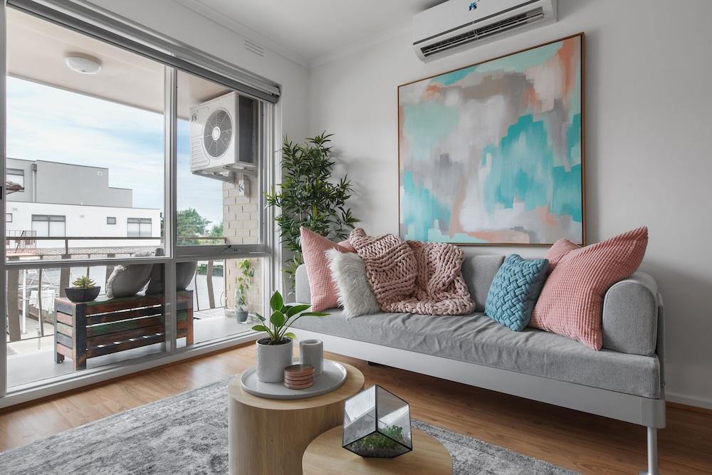 Heart of Ormond Apartment  by Ready Set Host Living Area